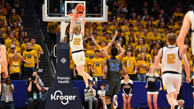 Ottawa-Glandorf's Colin White raises up for a dunk against Lutheran East in the 2023 OHSAA Division III state championship game.